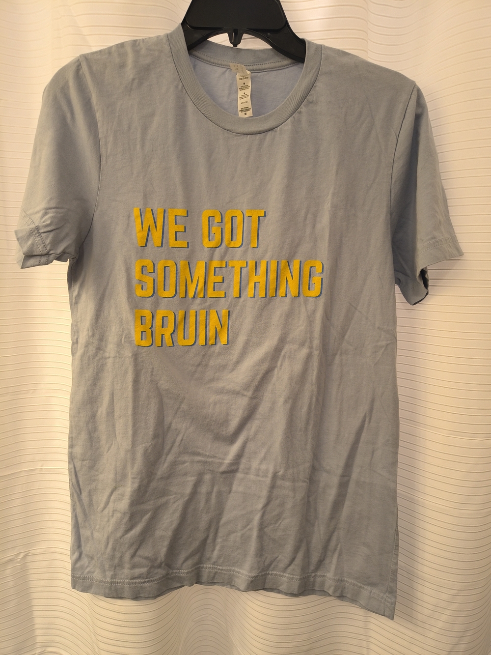 Bella Canvas Light Blue Tee with Yellow Graphic Text